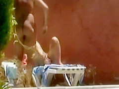 Horny couple fuck is spied by the pool