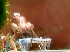 Horny couple fuck is spied by the pool