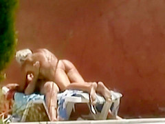 Horny couple fuck is spied by the pool