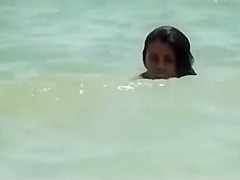 Spying hot girls on a party beach