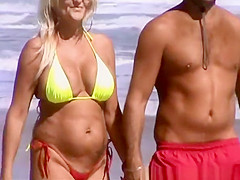 Mature woman in bikini with big tits
