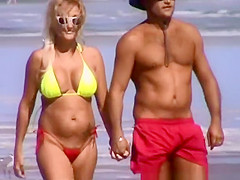 Mature woman in bikini with big tits