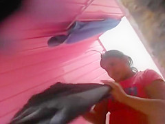 Chubby latin woman spied in pool cabin