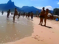 Firm young ass voyeured on a beach