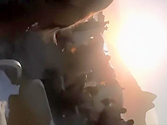 Firm young ass voyeured on a beach