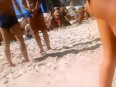 Firm young ass voyeured on a beach