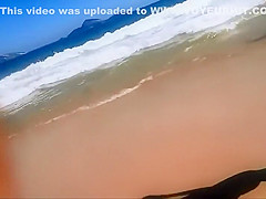 Firm young ass voyeured on a beach