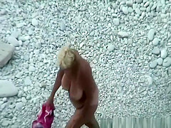 Mature nudist blonde woman