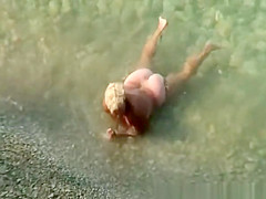 Mature nudist blonde woman