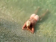 Mature nudist blonde woman
