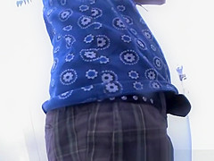 Girl spied in beach cabin changing