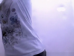 Woman with tan lines caught in beach cabin