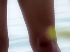 Beautiful beach girl is fully inspected
