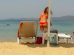 Sexy ass brunette chick in red bikini