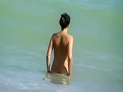 Topless woman and nudist friend