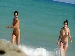 Topless woman and nudist friend