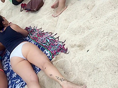 Naked pussy of a beach girl