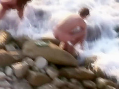 Hot girl fucks a guy on nudist beach