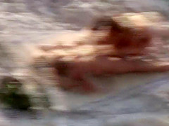Hot girl fucks a guy on nudist beach