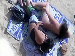 Spooning and fucking on the beach