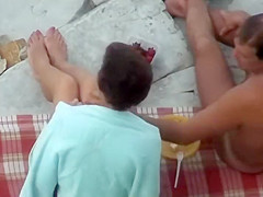 Mature nudist woman gets her pussy licked