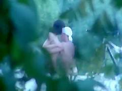 Doggy style fuck caught on the beach