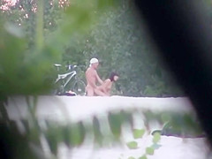 Doggy style fuck caught on the beach