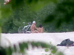 Doggy style fuck caught on the beach