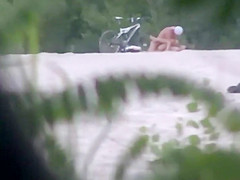 Doggy style fuck caught on the beach