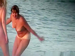 Nudist lesbian lovers taking pictures