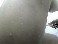 Tattooed nice ass woman in shower cabin
