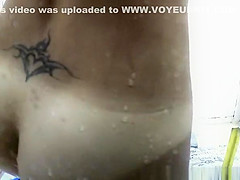 Tattooed nice ass woman in shower cabin