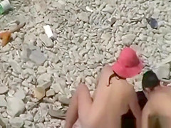 Nude man spills drink on woman's ass