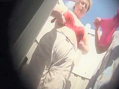 Mature women in the beach cabin