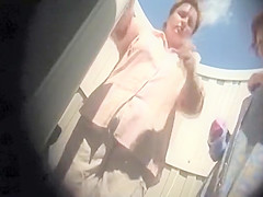 Mature women in the beach cabin