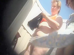 Mature women in the beach cabin