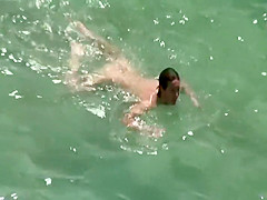 Naked girl chilling in the warm water