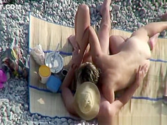 Mature nudist in husband's arms