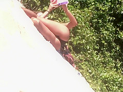 Hot girl was bored on beach