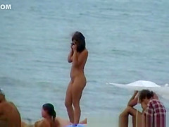 Topless Woman on the Beach