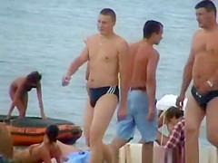 Topless Woman on the Beach