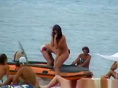 Topless Woman on the Beach