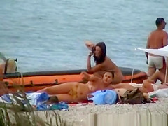 Topless Woman on the Beach