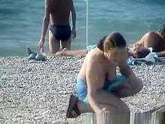 Topless Woman on the Beach