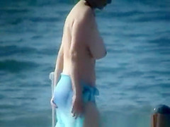 Topless Woman on the Beach