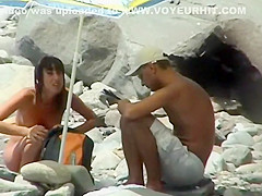 Couple trying to fuck on the beach