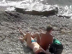 Husband whispers in her ear