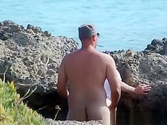 Sex by rocks on the beach