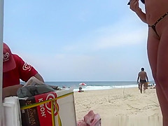 Micro bikini stuffed in her pussy lips