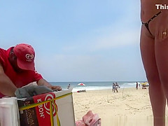 Micro bikini stuffed in her pussy lips